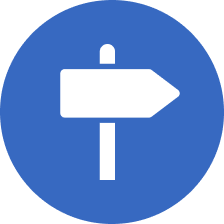 Blue circular sign with a white arrow pointing to the right