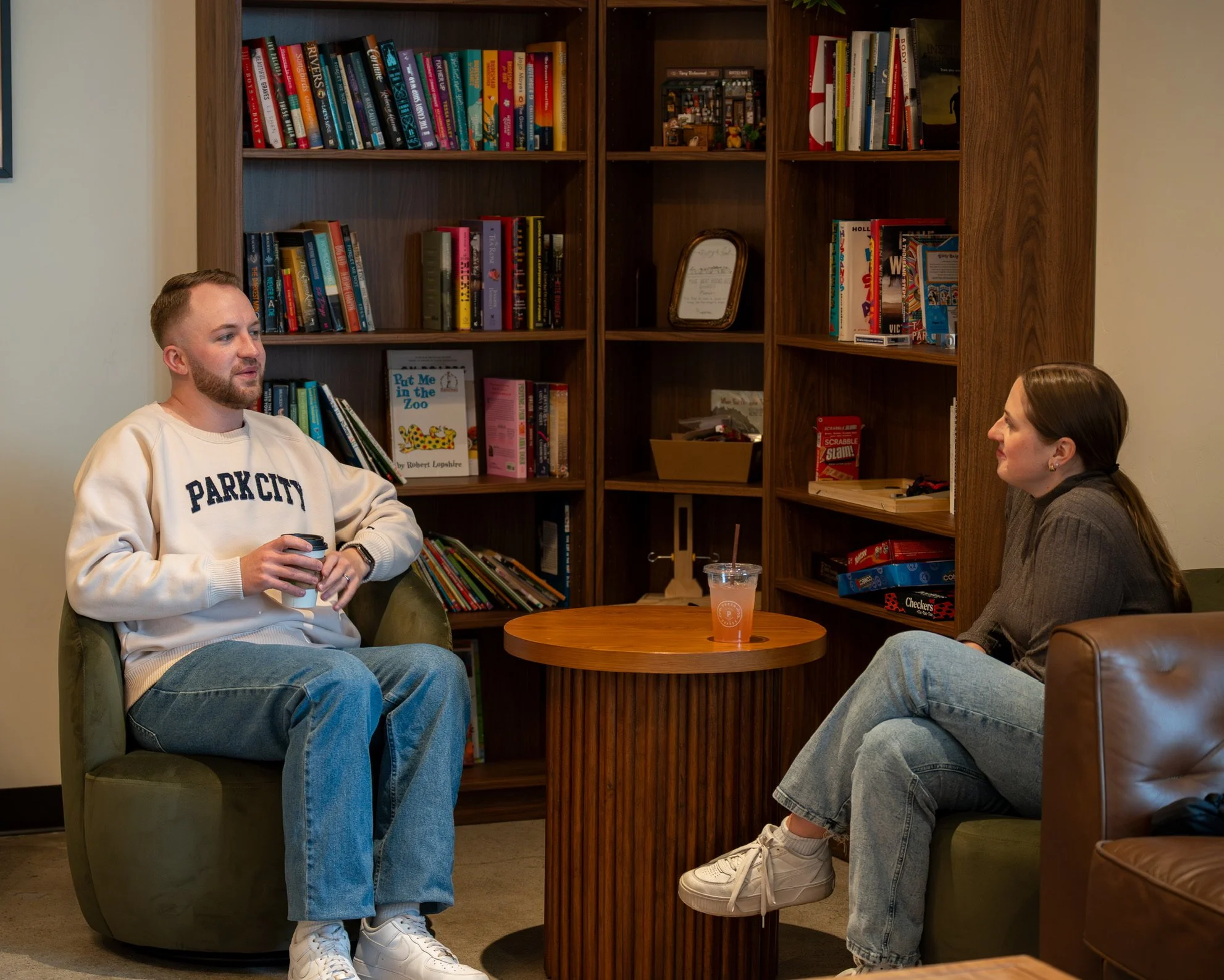 Brett Nielsen having a conversation over coffee with a constituent at Porch Coffee in Lehi, Utah