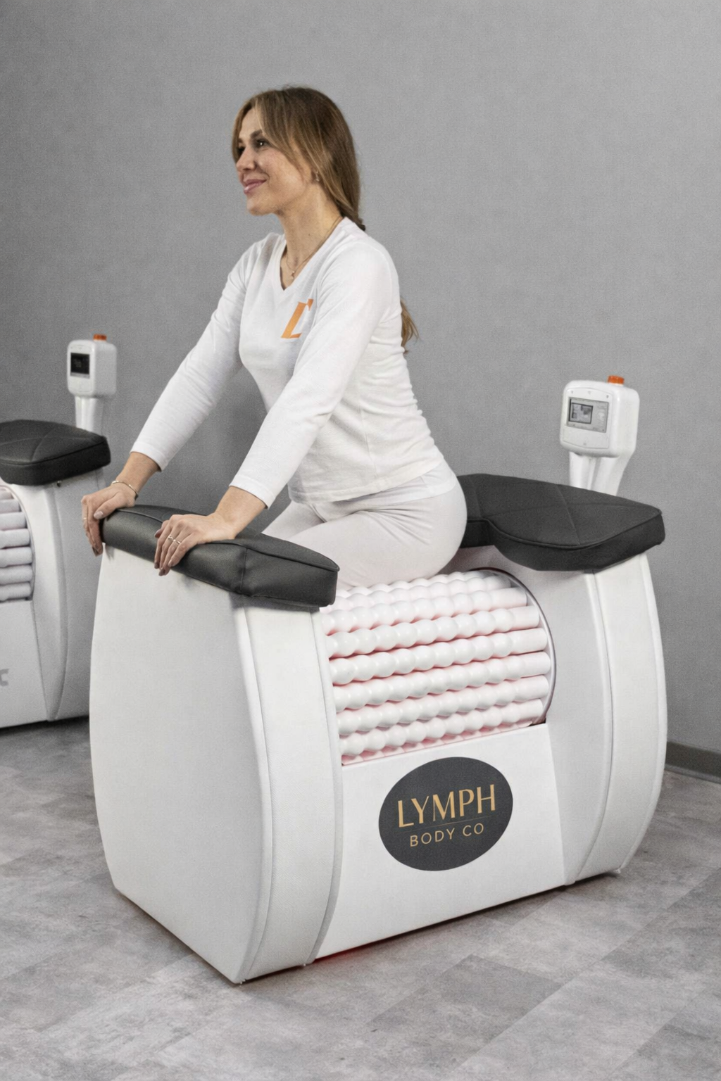 Professional lymphatic roll therapy machine treatment in a UK wellness clinic.