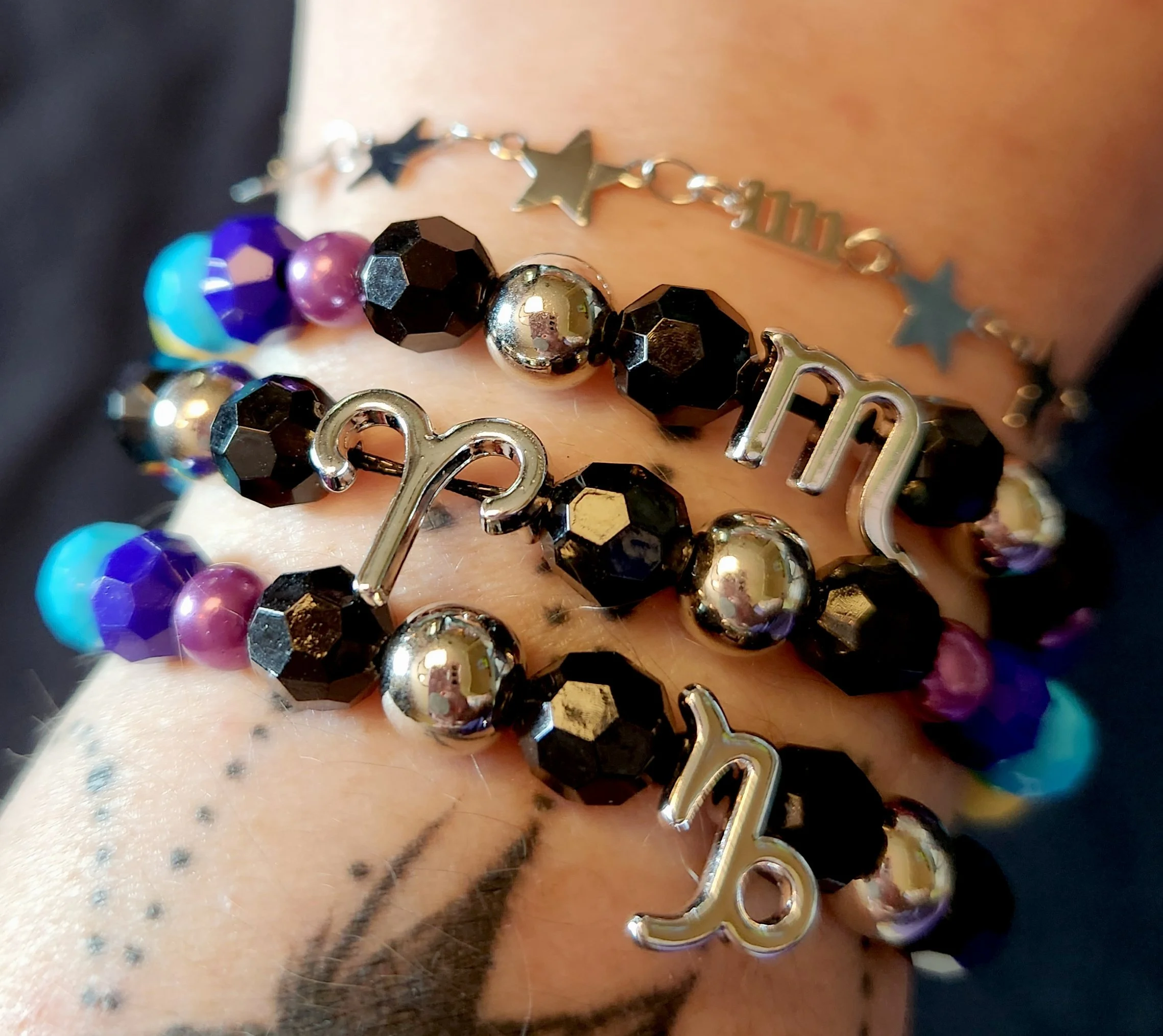 pride_zodiac_symbol_silver_wrist2.jpg