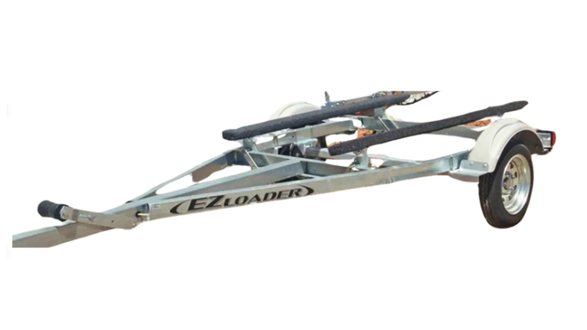 A boat trailer labeled EZ Loader with a single wheel on the right side, designed for transporting a boat, with adjustable support pads on top.