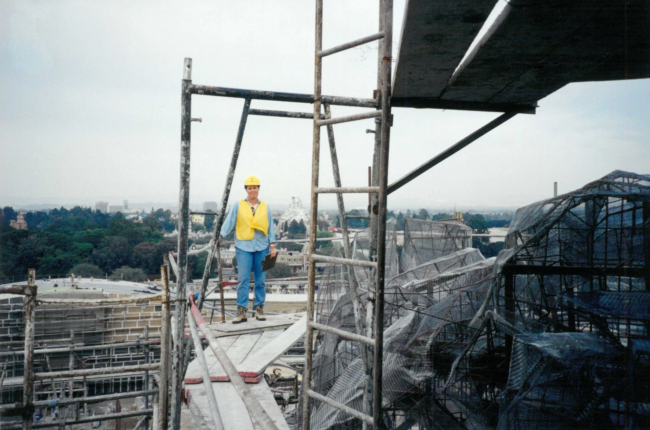 Nancy on top of the bear head during a site inspection during construction.  