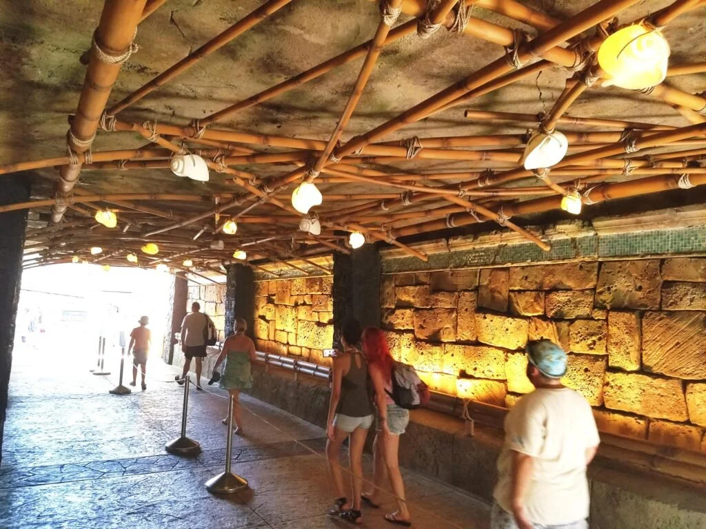 Tunnel Theming at How to Train Your Dragon Ride:   Carved plaster themed ceiling and stone face plaster faux stone block theming.  