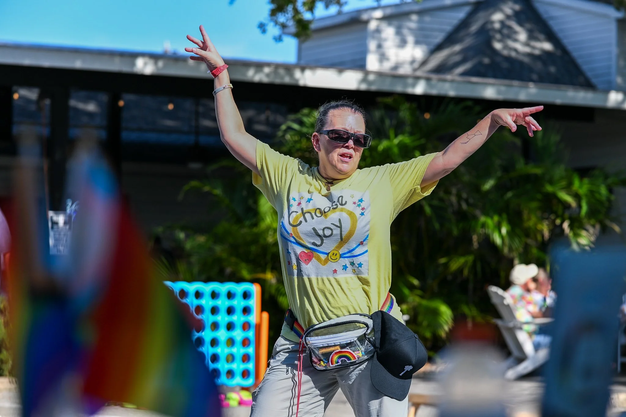 Dancing volunteer at a community event in Dunedin, FL for LGBTQ Pride Month