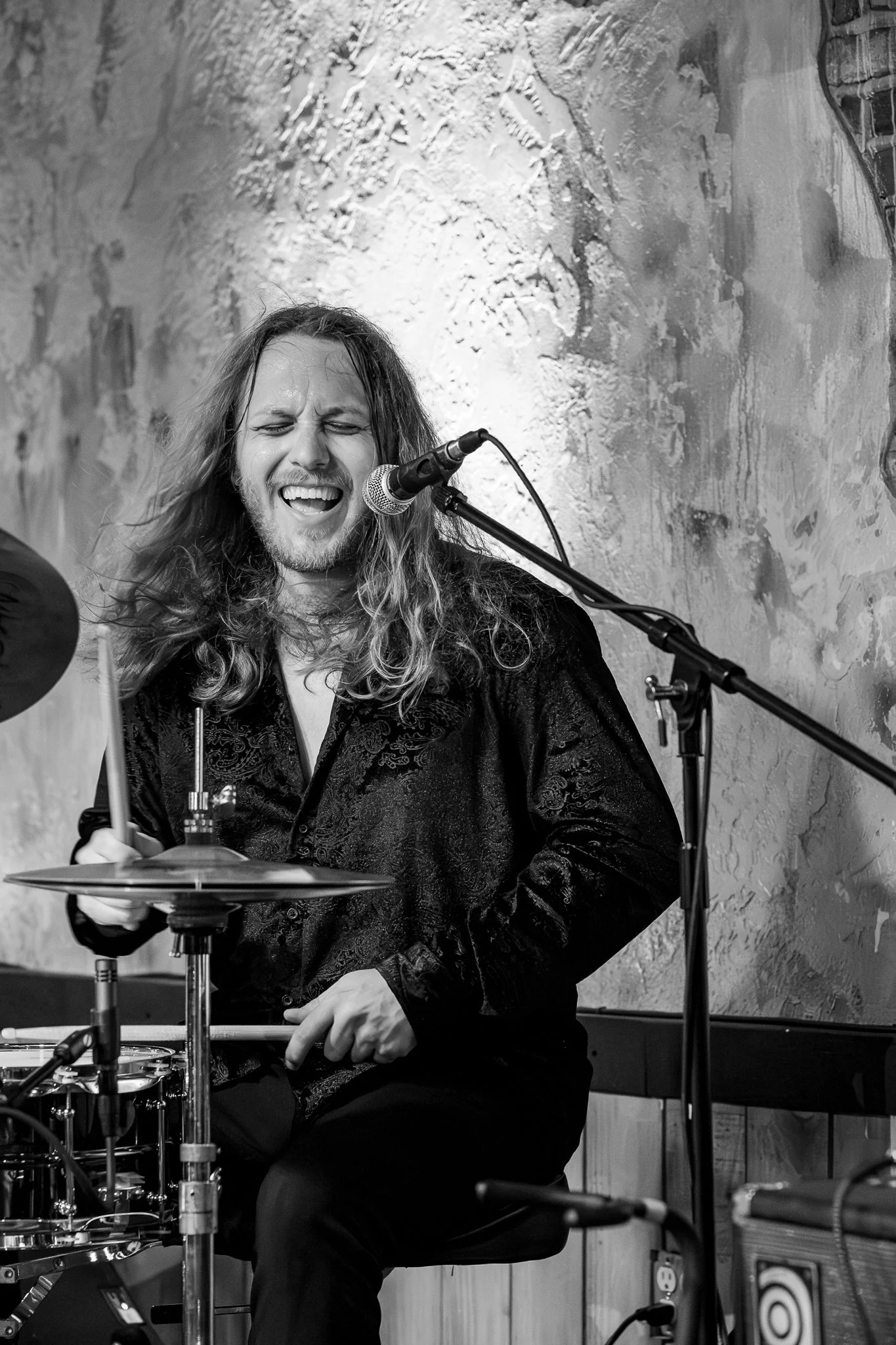 Drummer in black and white during music festival in Saint Petersburg, FL at local brewery for a non-profit event photography 