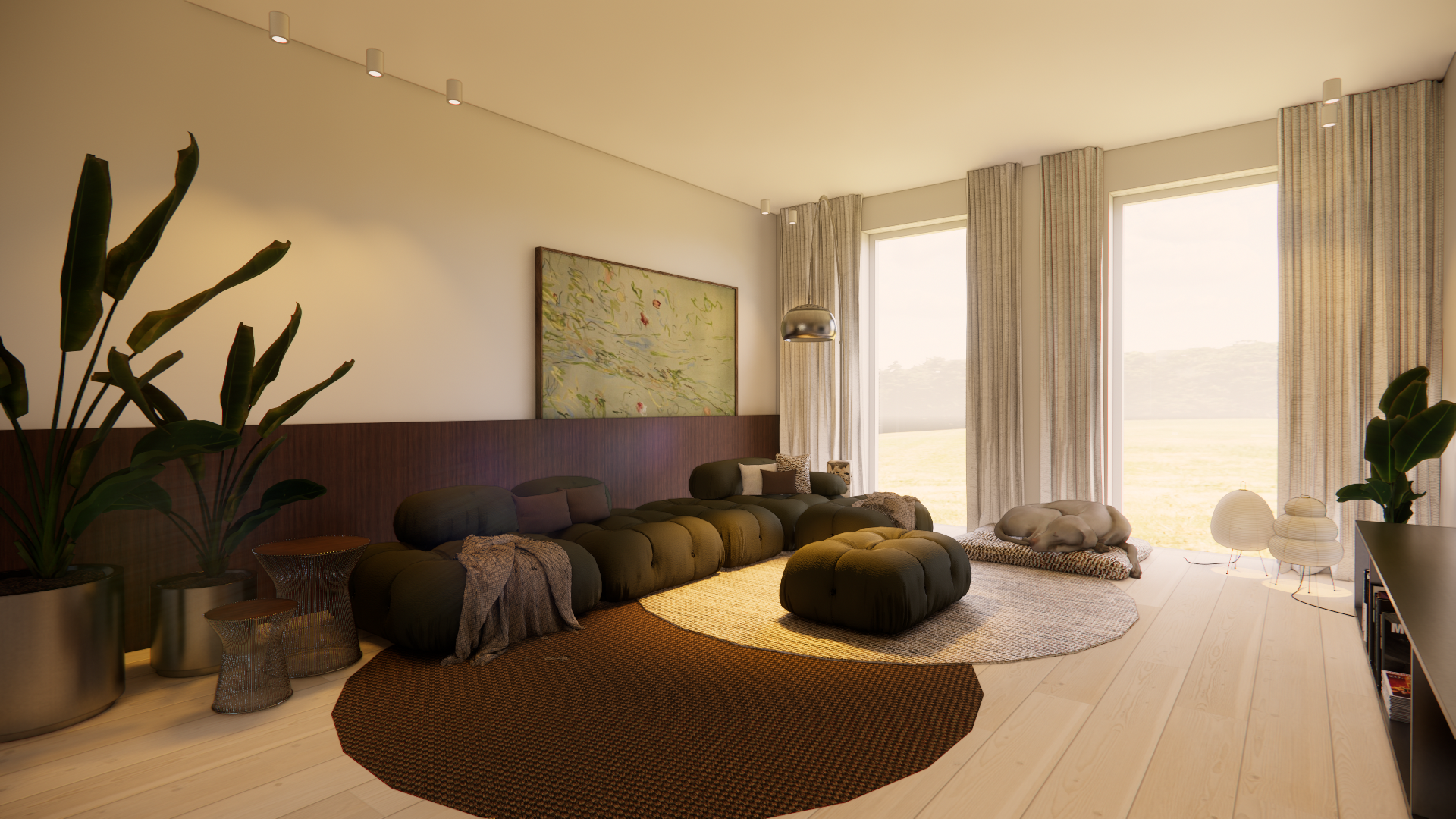 Modern living room with large windows, beige curtains, dark sectional sofa, round rugs, indoor plants, and artwork on the wall.