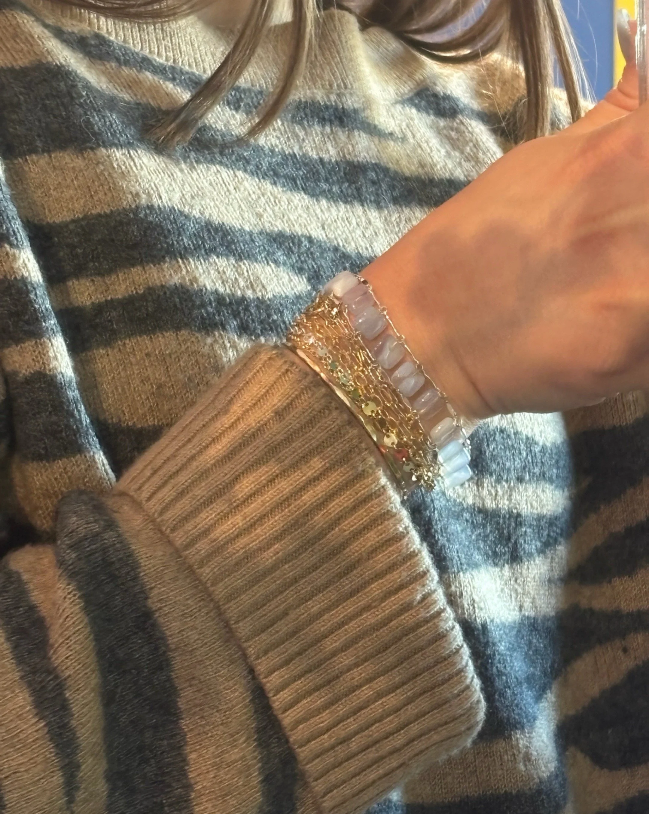 Exploring neutrals, softness, and harsh metallics. 