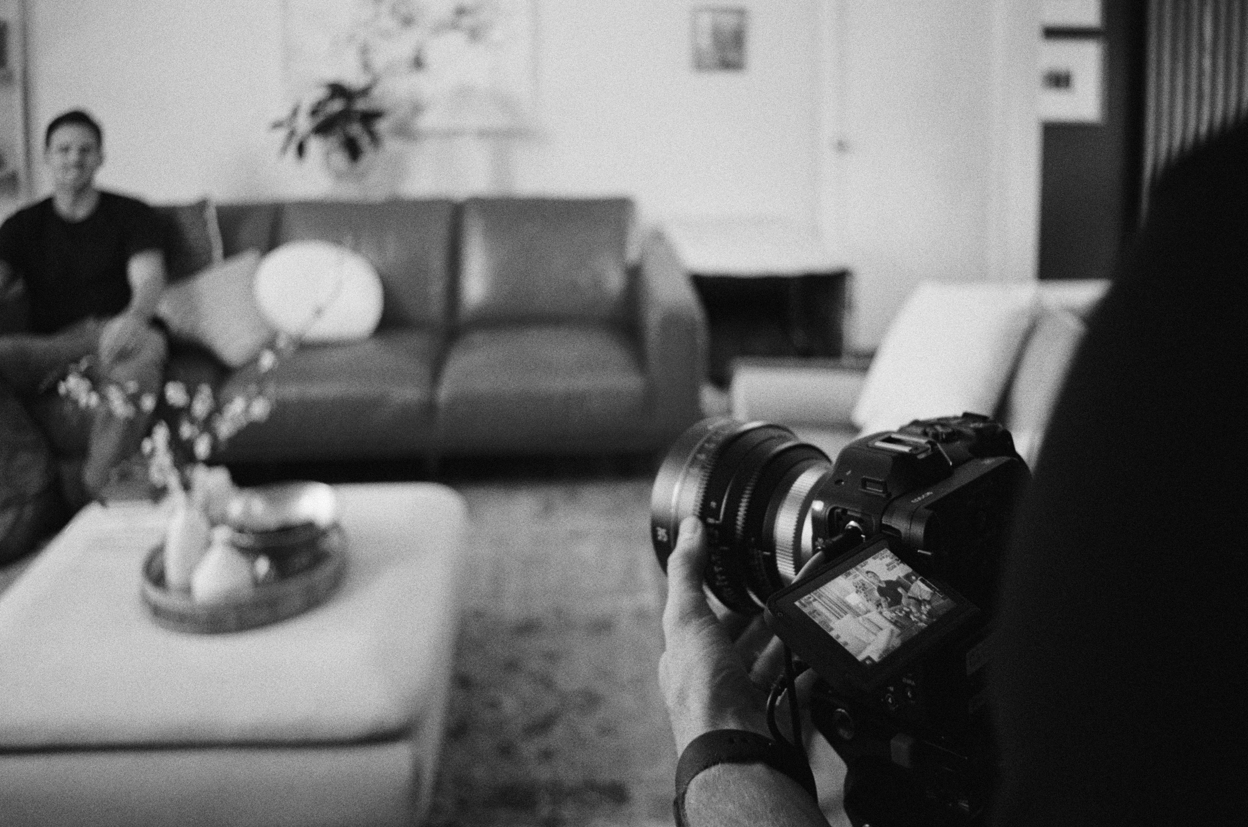 Camera operator filming an interview for a Flecko commercial video