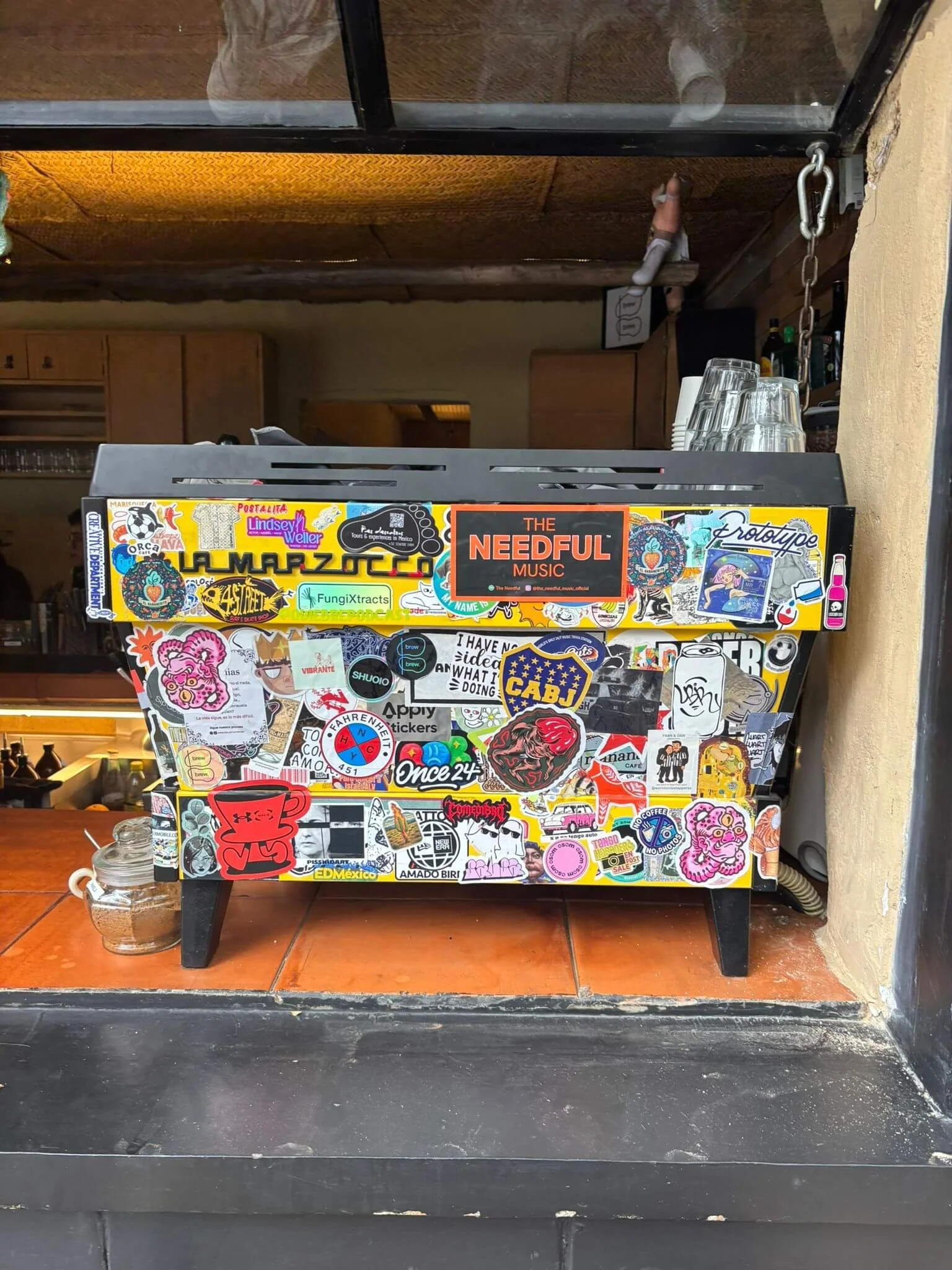 sticker-on-espresso-machine.jpeg