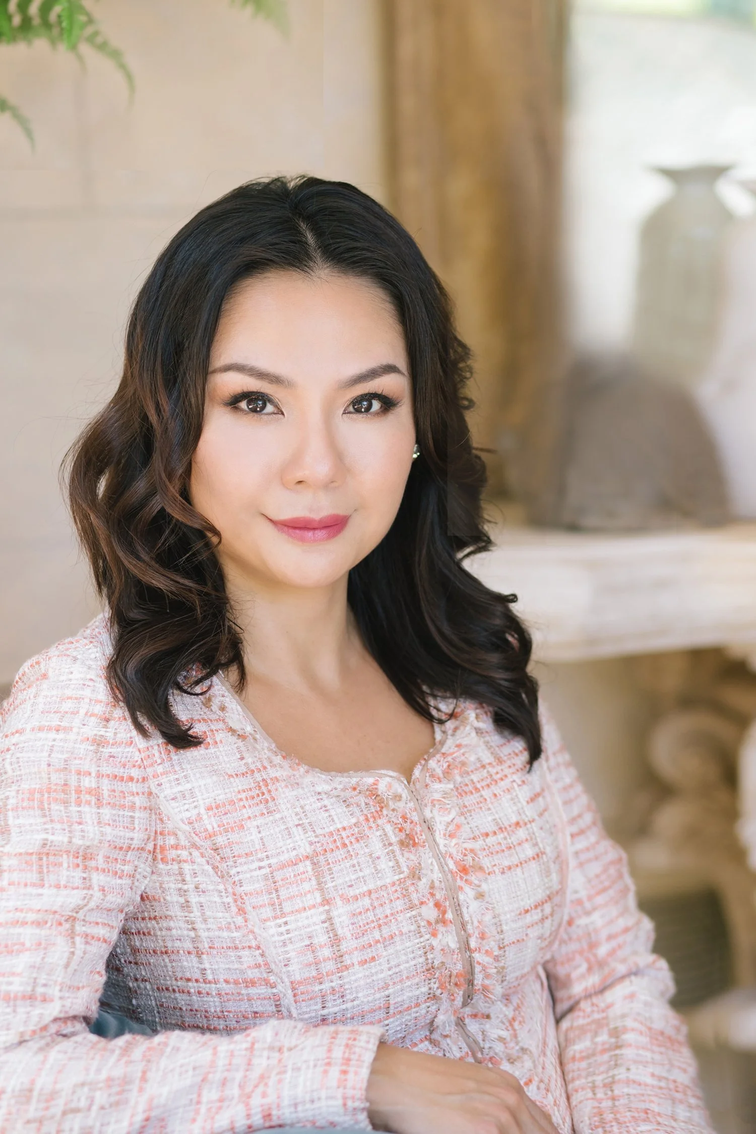 Approachable business portrait of a woman laughing naturally in San Marino CA