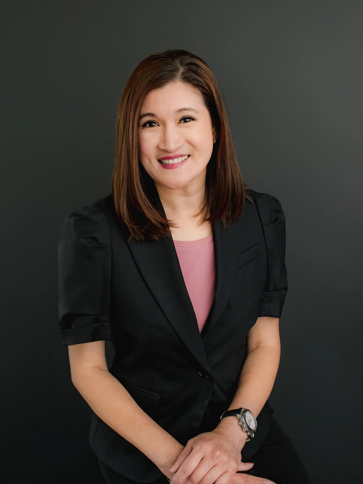 Relaxed studio headshot of a woman with soft lighting at Shinkfield Studio San Marino