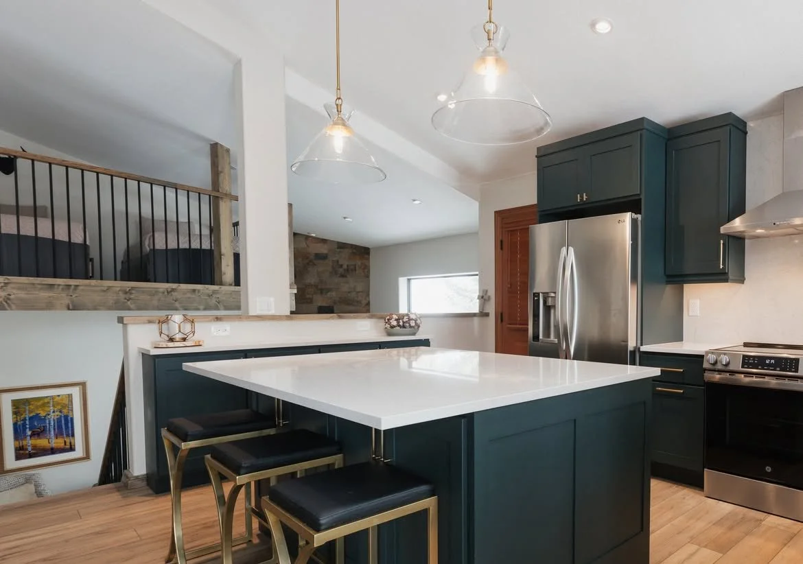 Modern dark blue kitchen with beautiful lighting