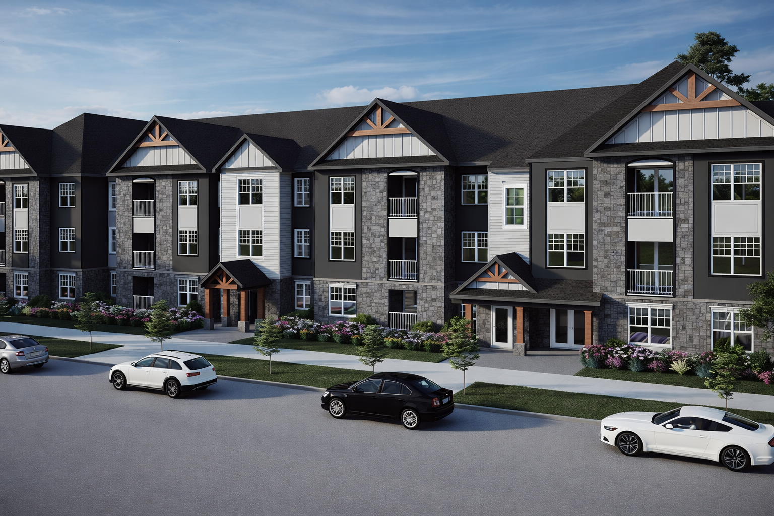 Apartment complex with stone and siding facade, and parked cars along the street during daytime.