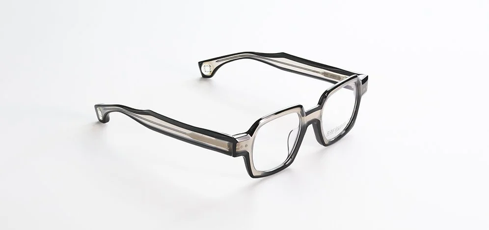 A pair of Blake Kuwahara eyeglasses with black frames on a white background.