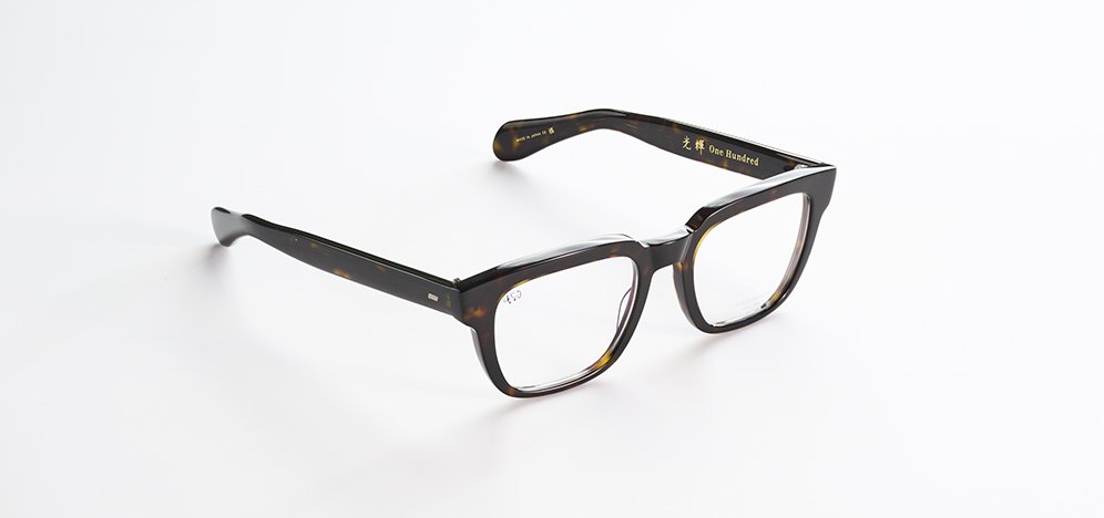 A pair of Masunaga black tortoiseshell eyeglasses on a white background.