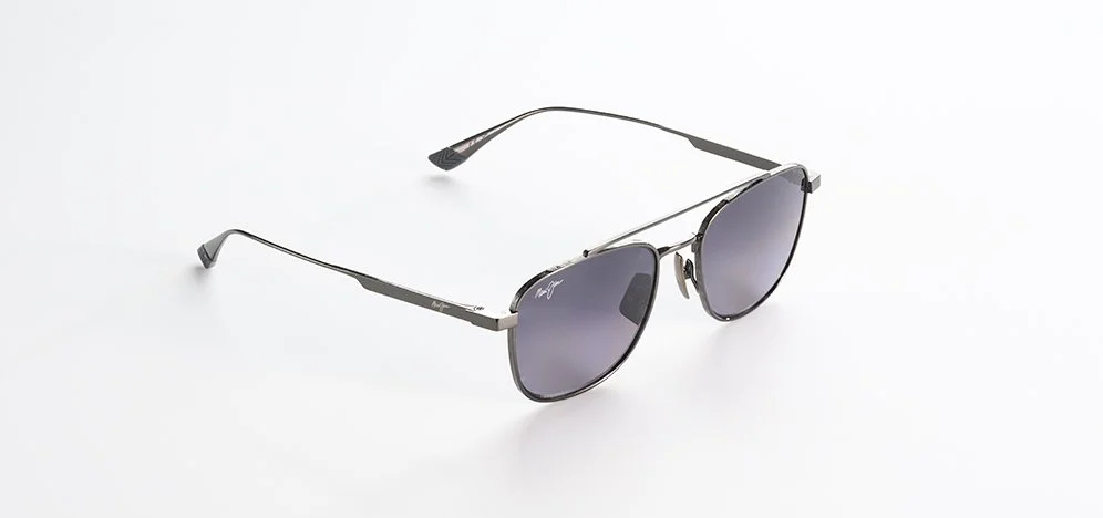 A pair of Maui Jim sunglasses with black frames and gray tinted lenses on a white background.
