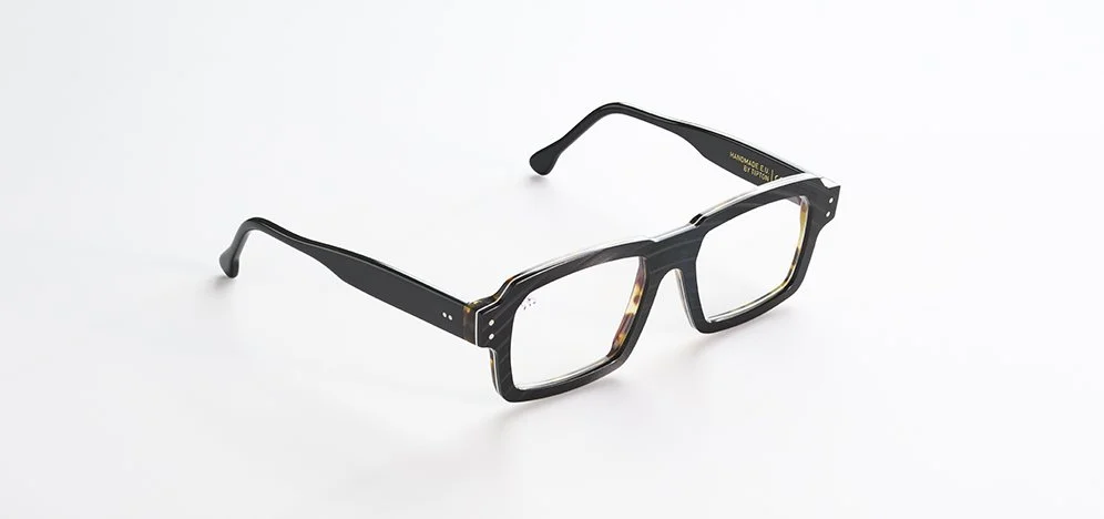 A pair of black Vinalize eyeglasses with rectangular frames on a white background.