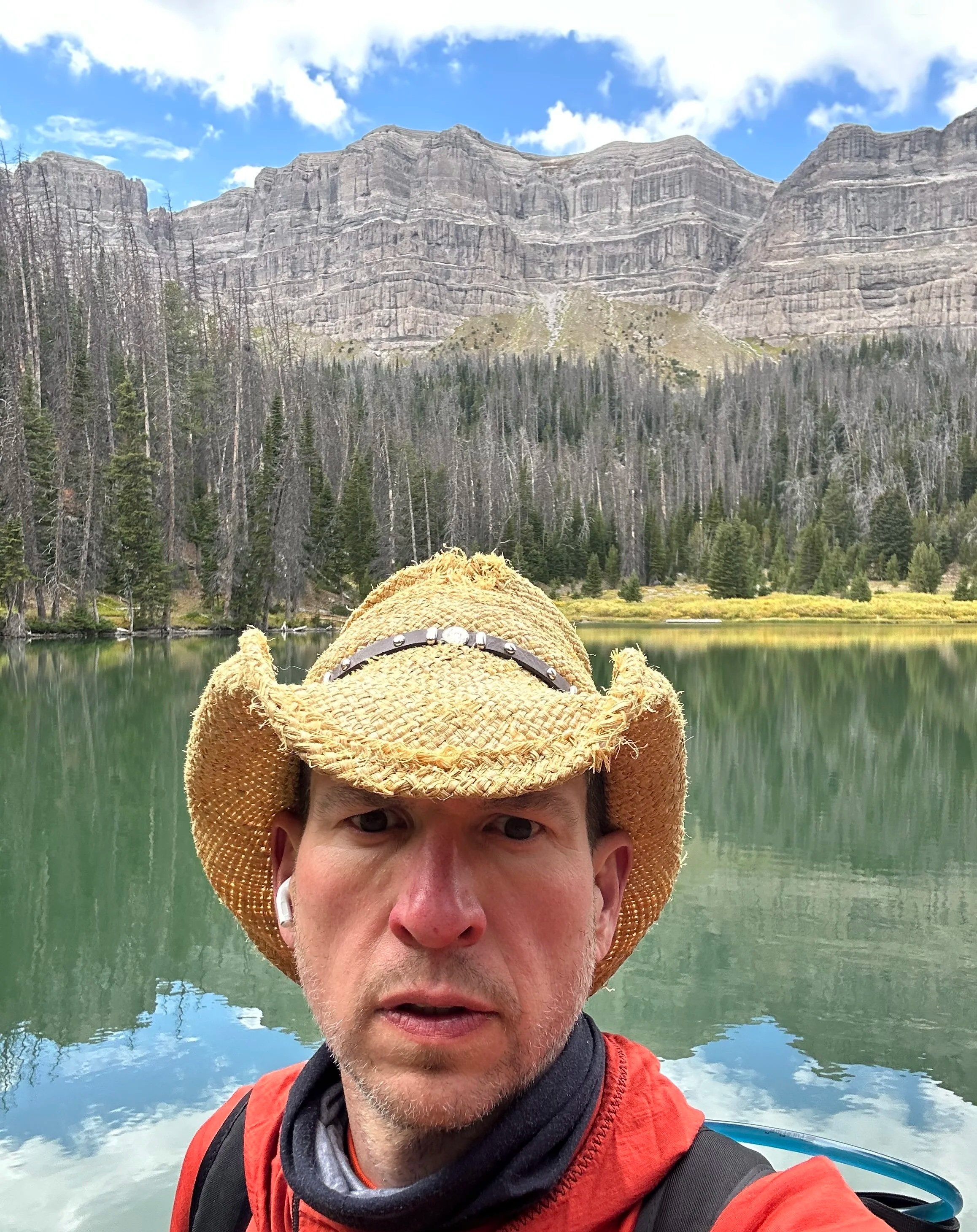 Eric standing in front of Upper Jade Lake in Wyoming