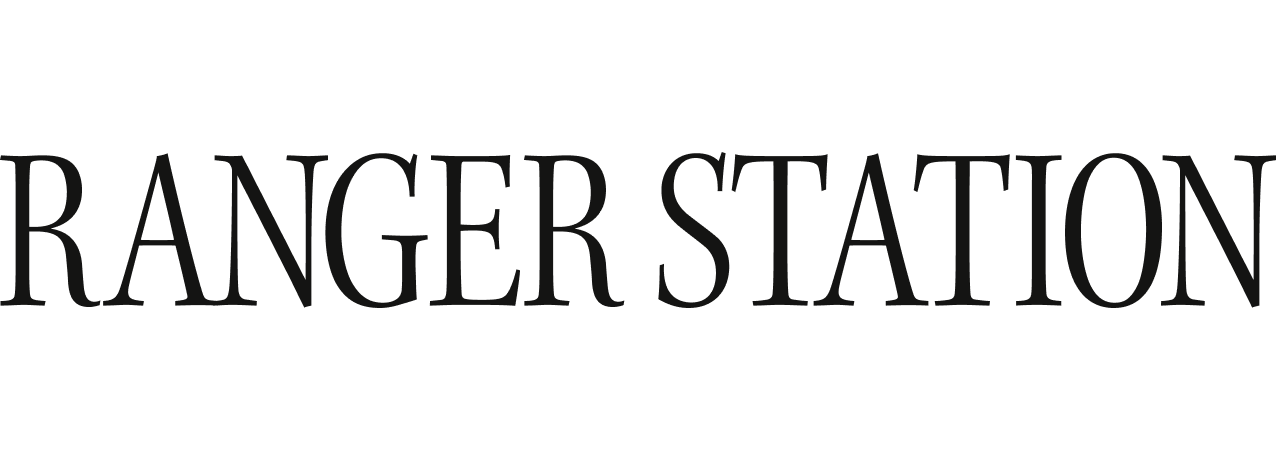 Text reads 'RANGER STATION' in black capital letters on a white background.