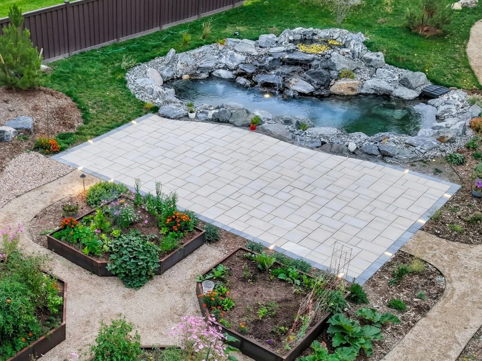 Custom Paver Patio and Pond for backyard garden area
