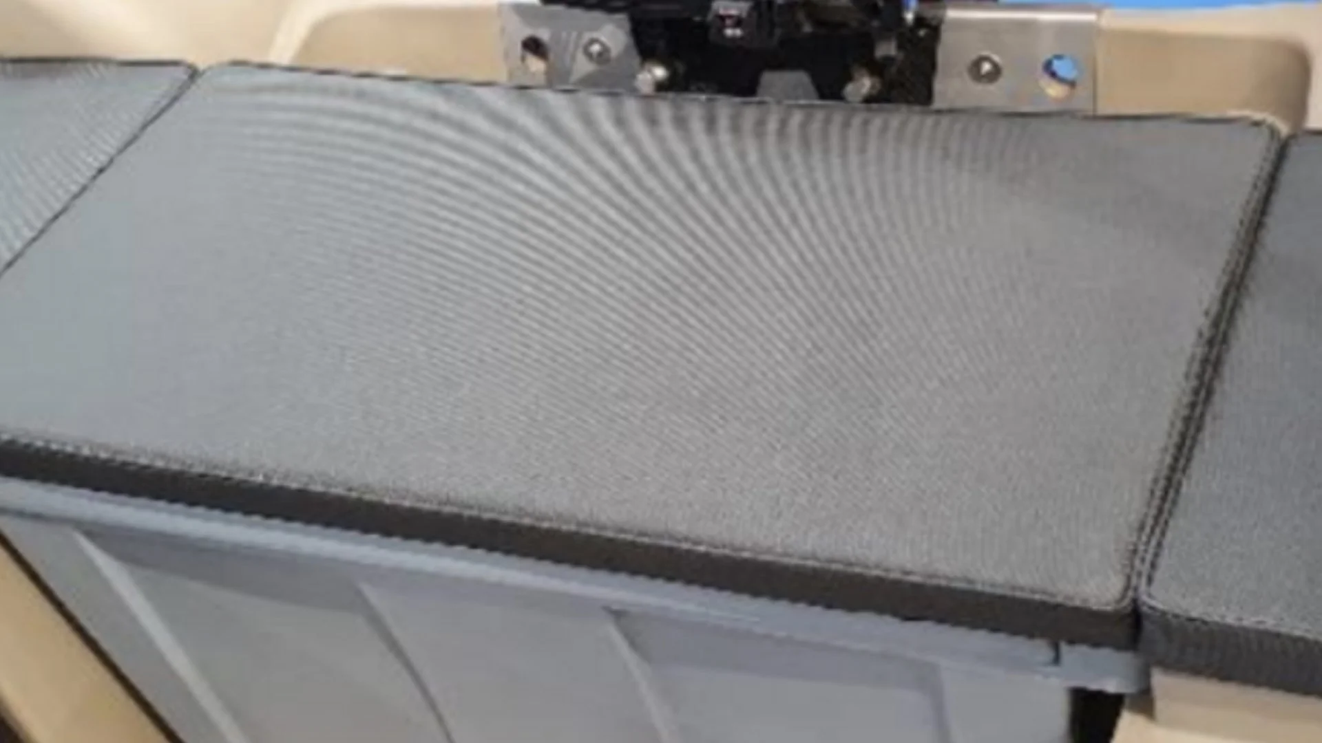 Close-up of a computer server or storage device with metal casing and ventilation slots.