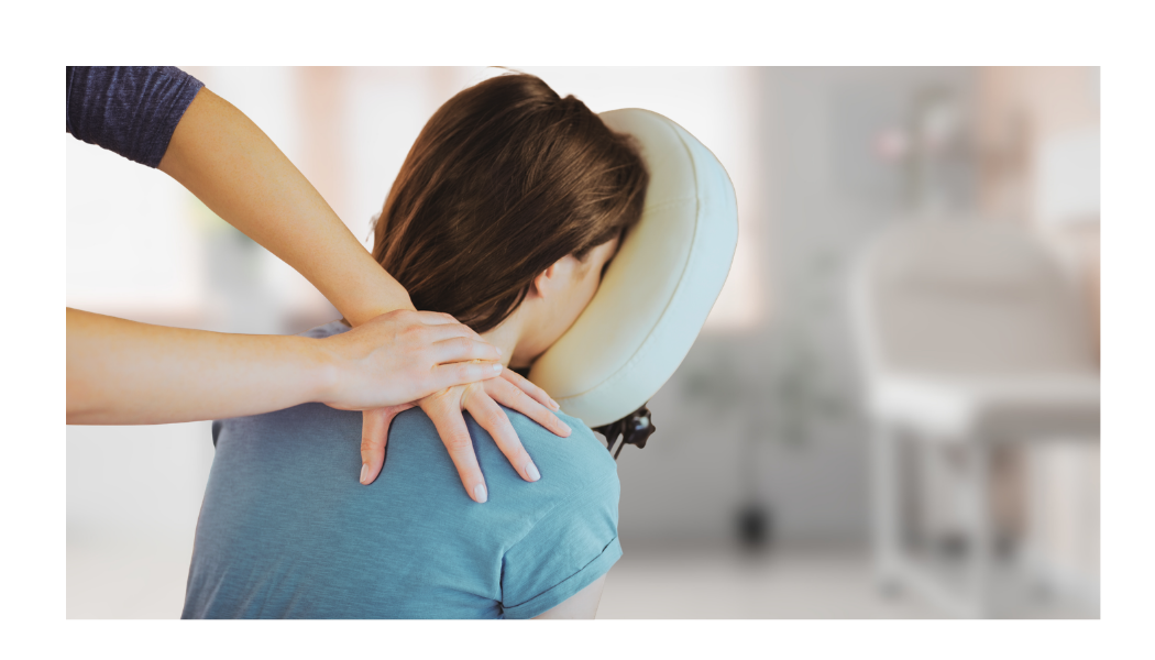 Person receiving a chair massage in a Workplace Wellness session.