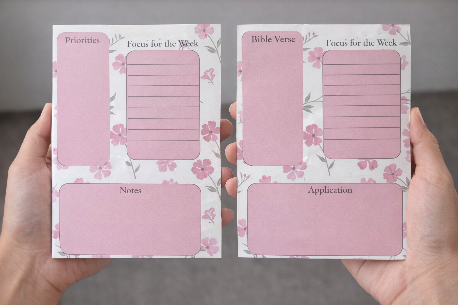 Two 5x7 Christian devotional tear-off notepads with pink floral pattern held in hands. One version features Priorities, the other Bible Verse, with weekly Focus, Notes, and Application sections.