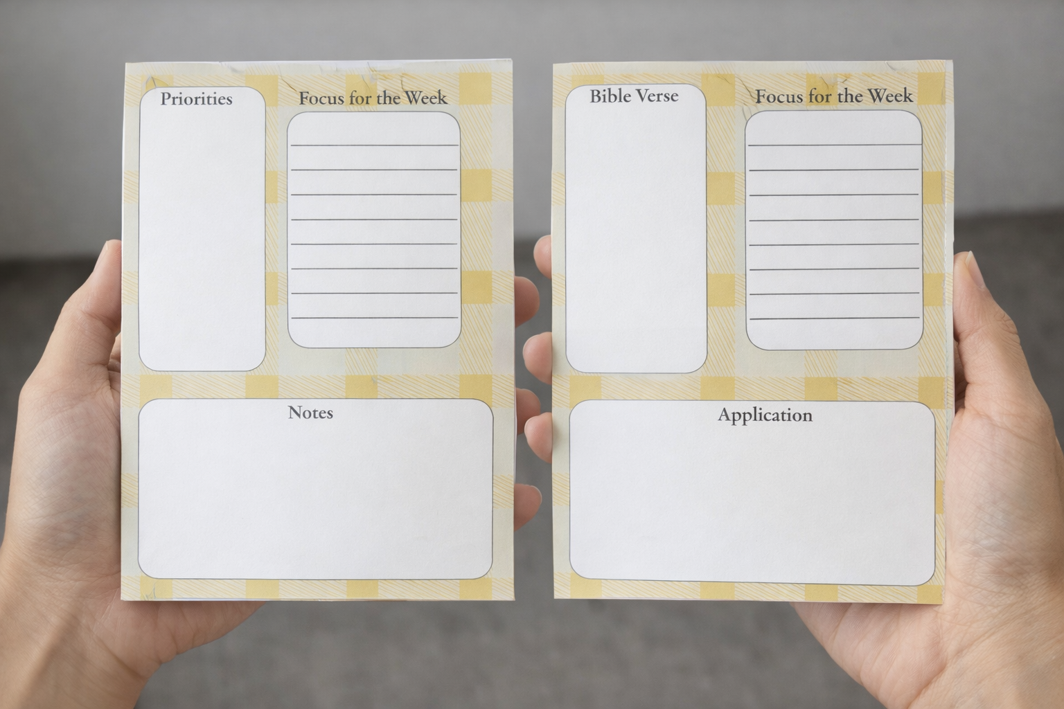 Two 5x7 tear-off devotional notepads with yellow plaid pattern held in hands. One features Priorities and the other Bible Verse, both with Focus for the Week, Notes, and Application sections.