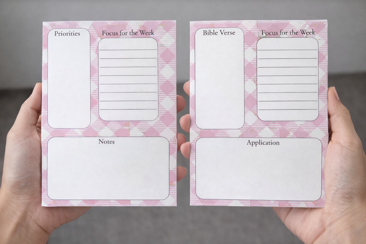 Two 5x7 tear-off devotional notepads with pink plaid pattern held in hands. One features Priorities and the other Bible Verse, both with Focus for the Week, Notes, and Application sections.