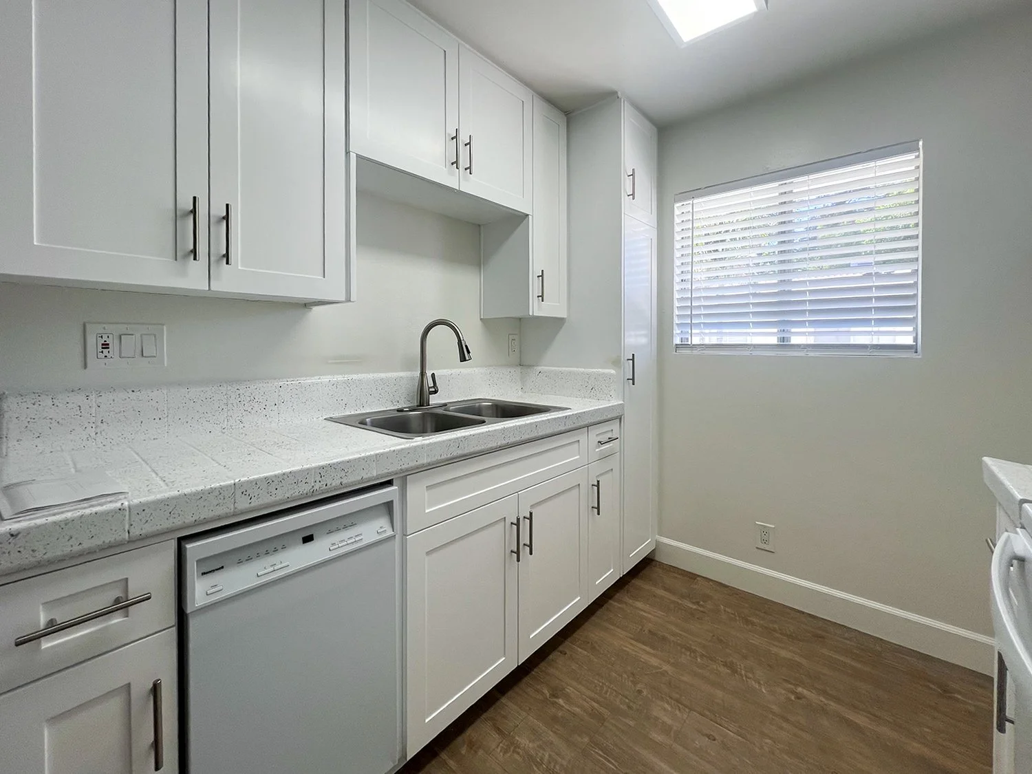 Renovated 1-Bedroom Unit Kitchen at Palm Vista 