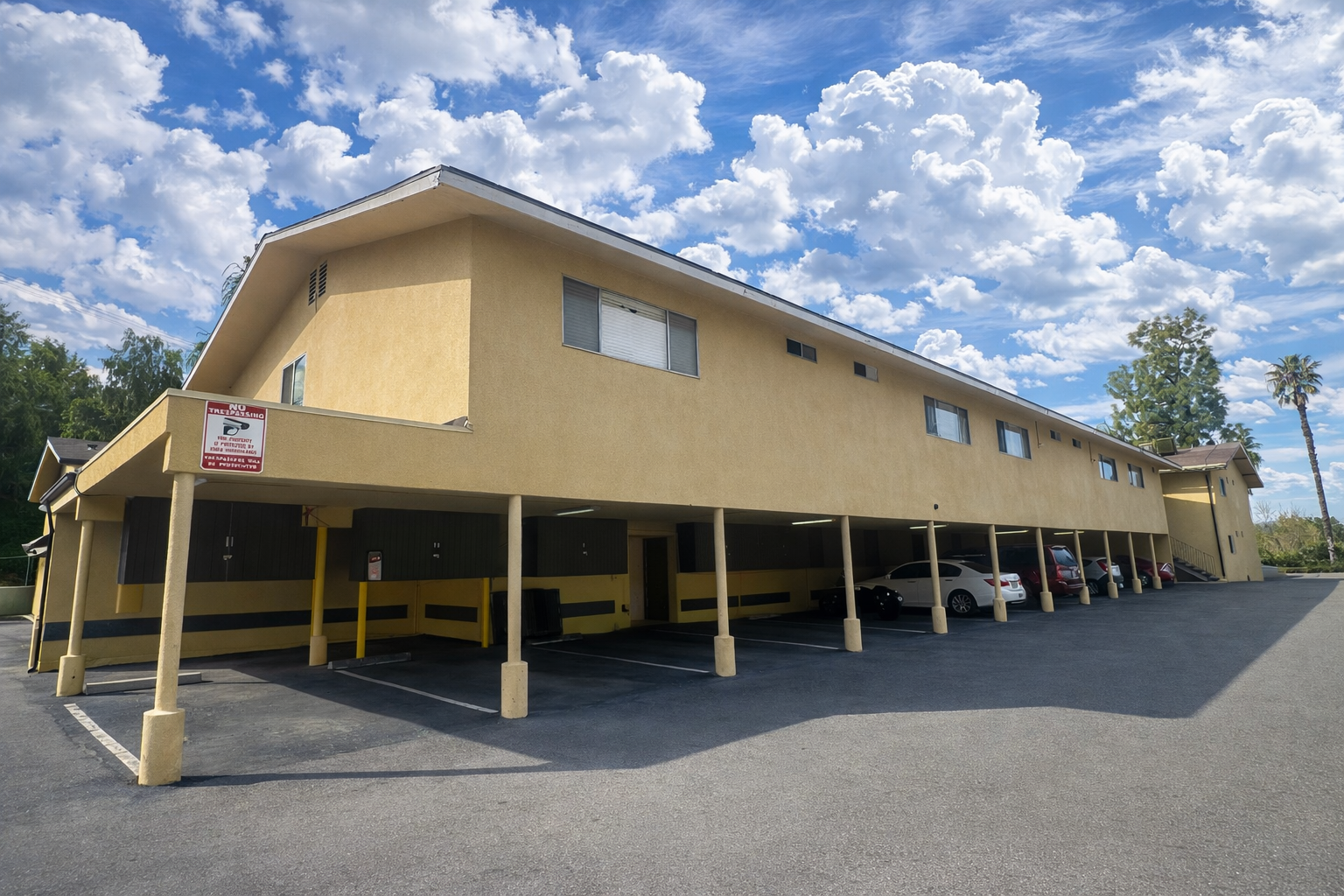 Covered parking at Palm Vista with locked additional storage boxes.