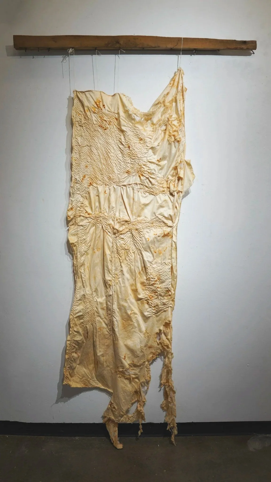 REPAIR, 2026 - bedsheet, thread, rust, dirt, wood, nails