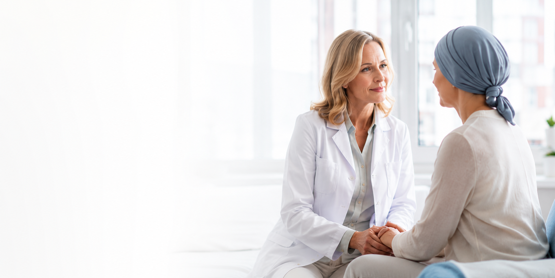 Oncologist talking to a patient that is clearly going through chemotherapy.