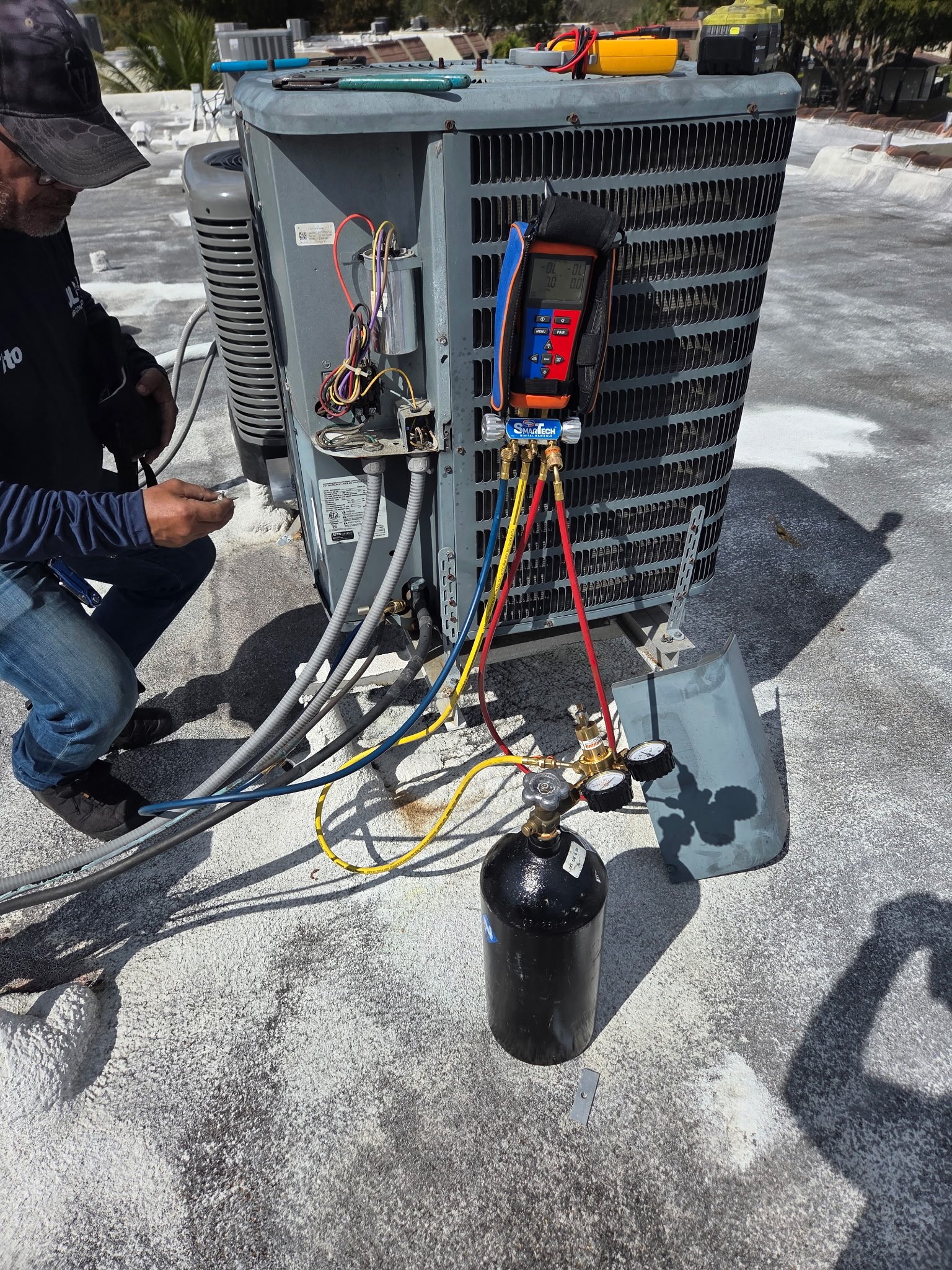 Diagnosing and repairng outdoor AC unit.