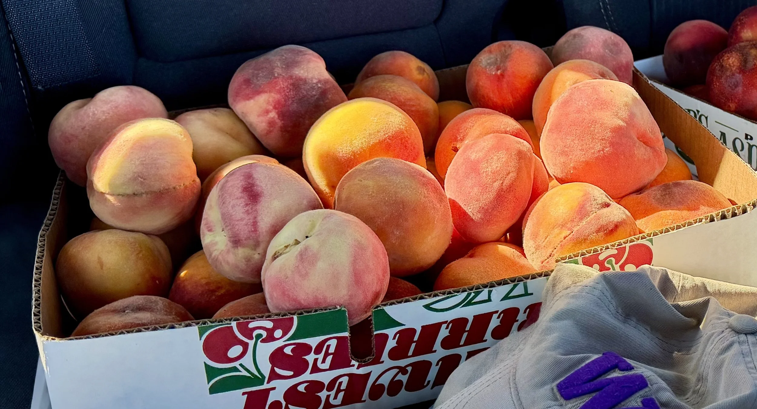 Box of #2 peaches, ripe and ready for jam making.