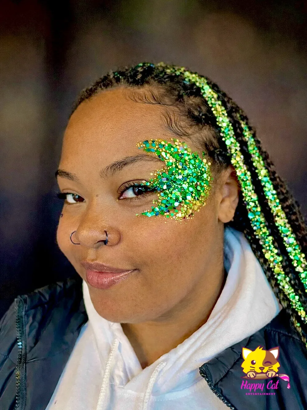 Sparkling green glitter eye and hair design for kids parties by Happy Cat Entertainment in Temecula.