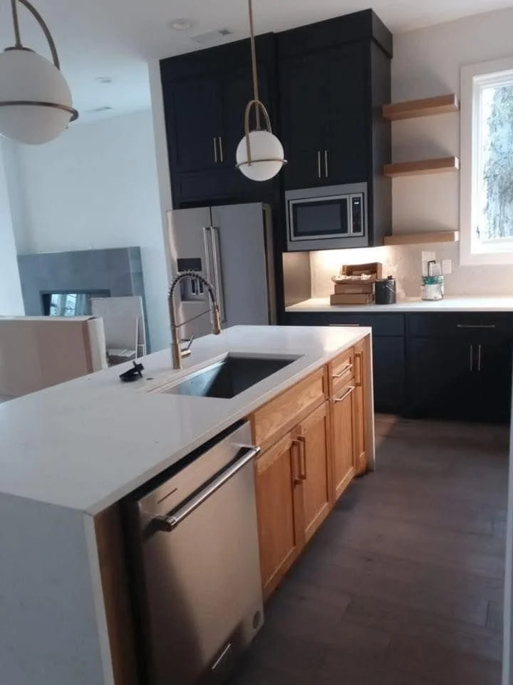 modern kitchen remodel with dark cabinets and updated countertops in Middle Tennessee home