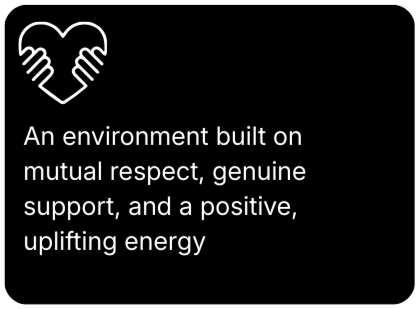 Text on black background reading: 'An environment built on mutual respect, genuine support, and a positive, uplifting energy' with a heart-shaped icon made of two hands.