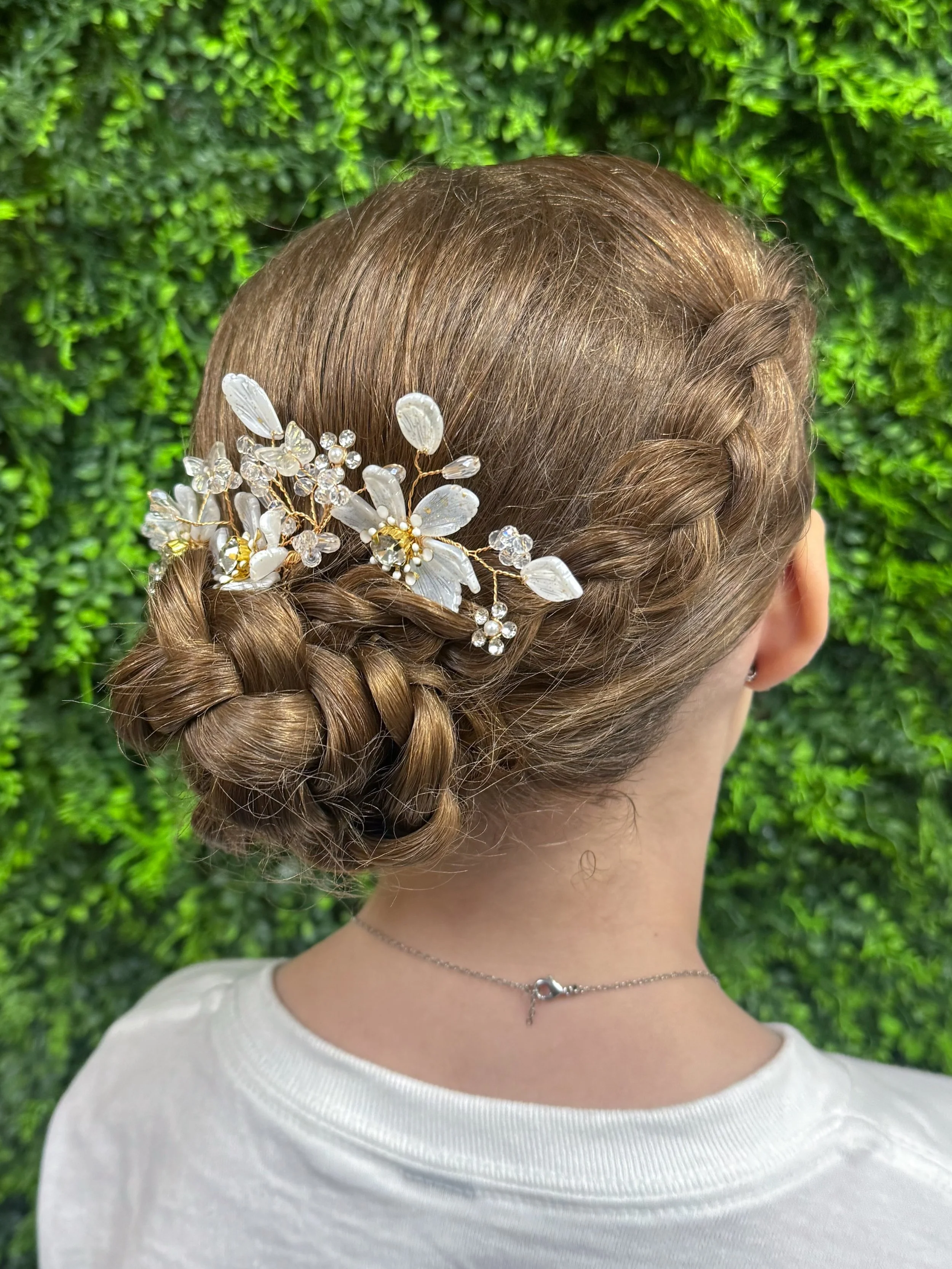 Precious hair and makeup for an even more precious homecoming attendant! Even on rainy days, some styles are built to last! Despite the weather being nasty before the Homecoming game, this sweet girls hair held all night long (and was still looking g