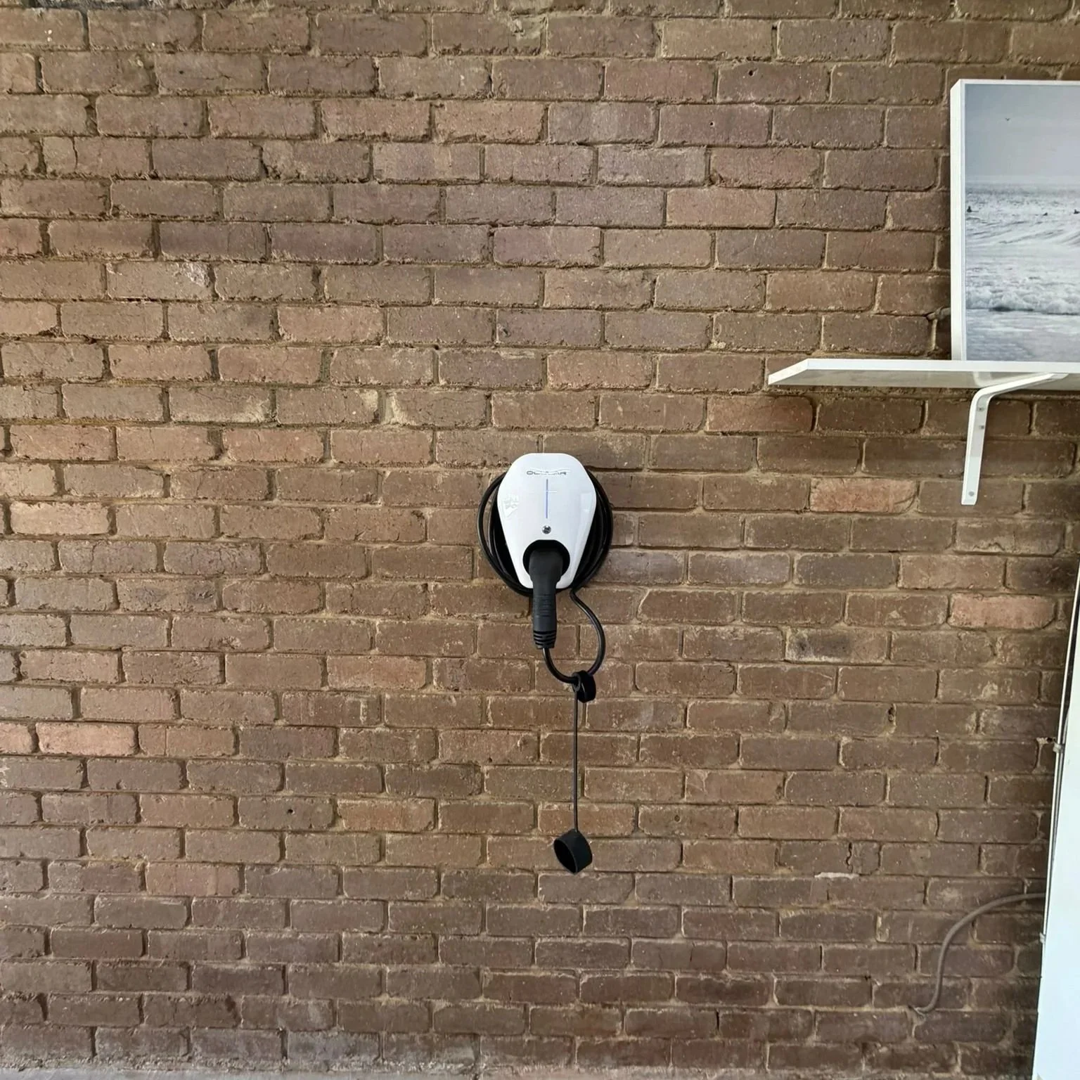  Ocular IQ Home 7kW EV charger installed on brick wall in Wheelers Hill residential property 
