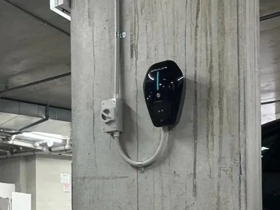Ocular IQ Home 7kW EV charger installed in Kew apartment basement car park by Aether Installations