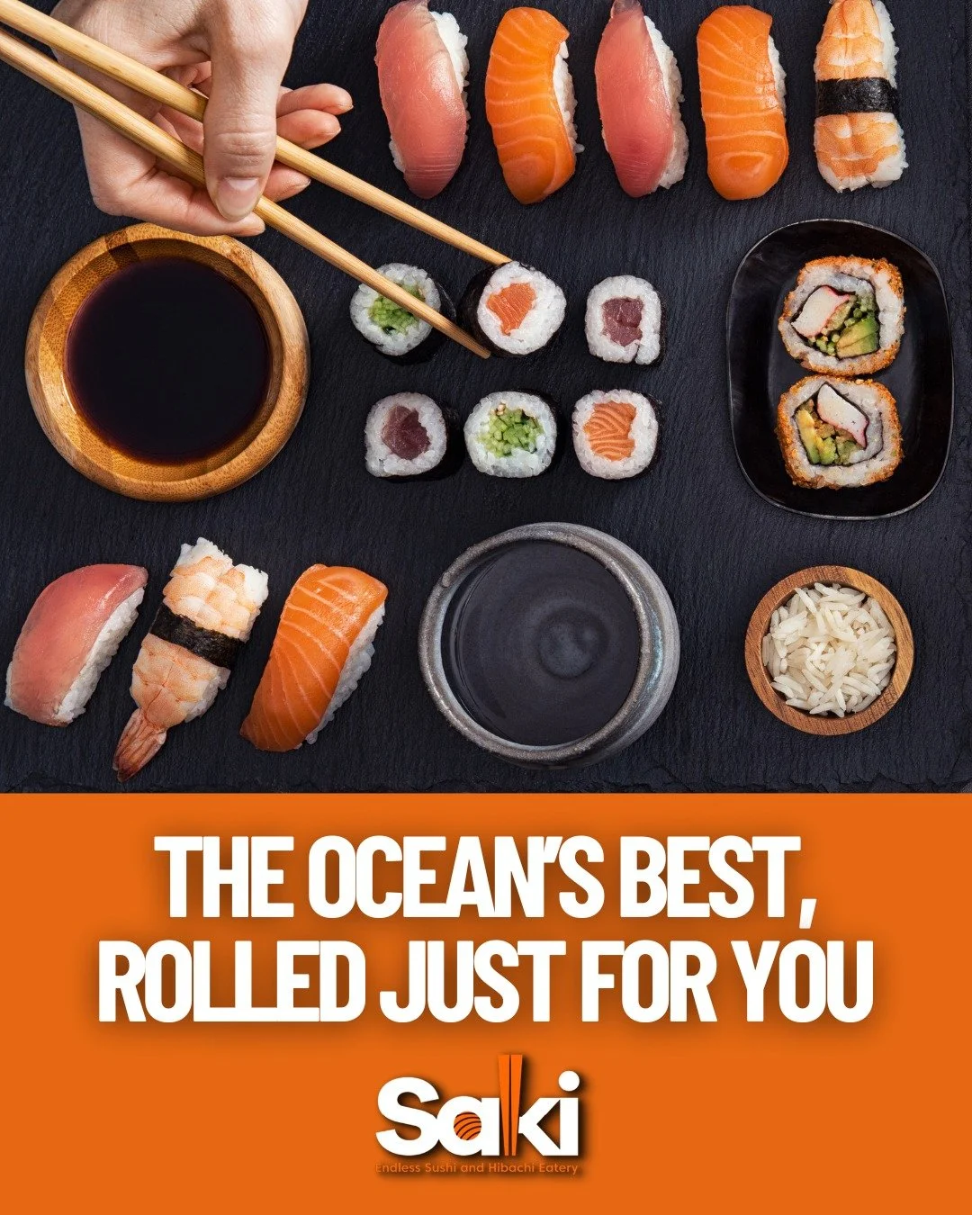 Various sushi pieces including nigiri, rolls, and sashimi, with soy sauce, pickled ginger, and wasabi on a black surface.