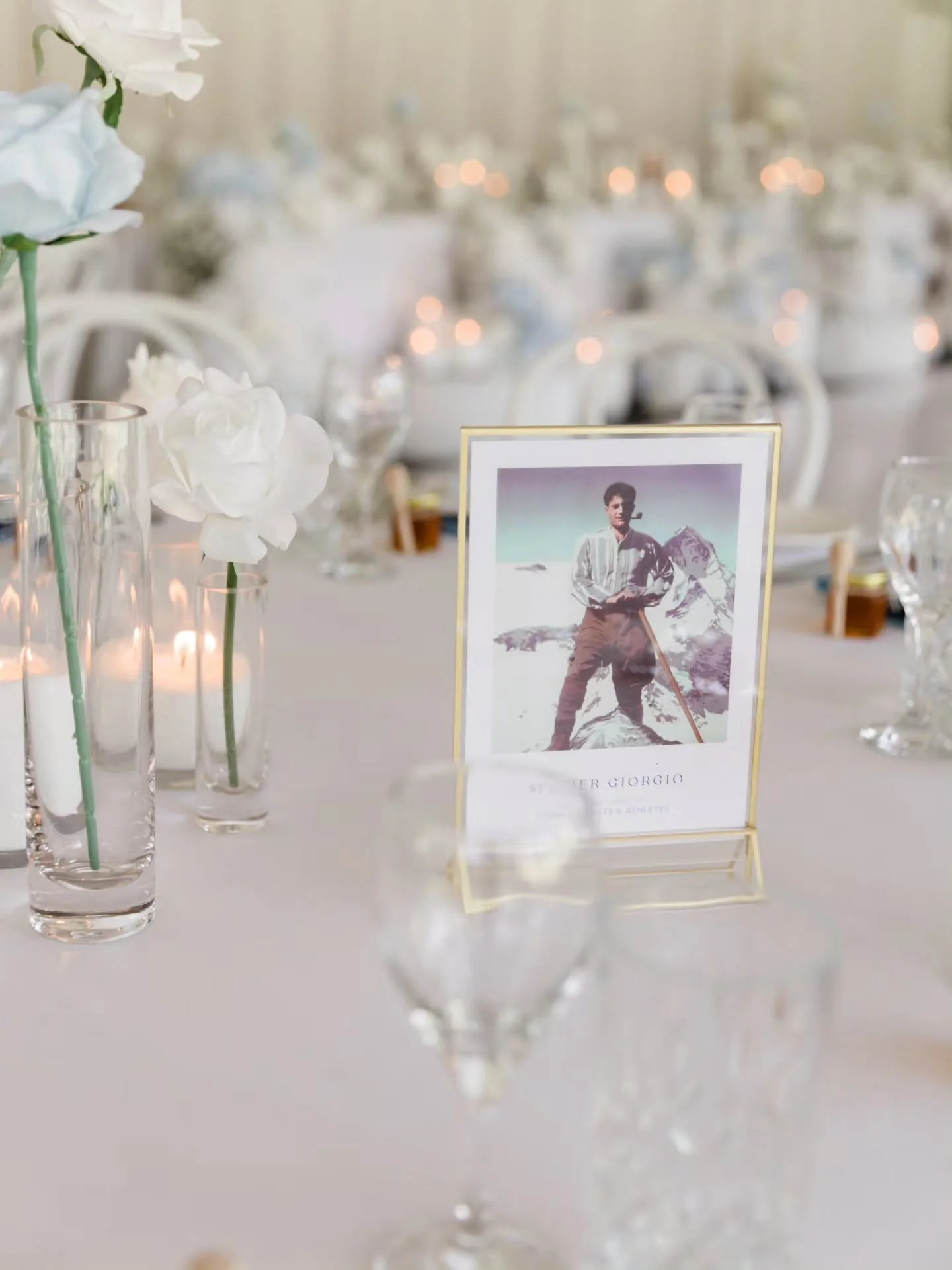 Why have table numbers when you can have Saints? 👀

A little trend has started amongst my clients, incorporating their favourite Saints into their table arrangements for their wedding day!!!

Instead of simply assigning a table number, each table is