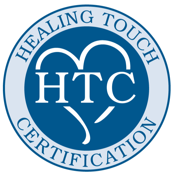 A circular logo with a light blue border and dark blue background, featuring the words 'Healing Touch Certification' around the border. In the center, there is a stylized heart with a heartbeat line and the letters 'HTC' inside.