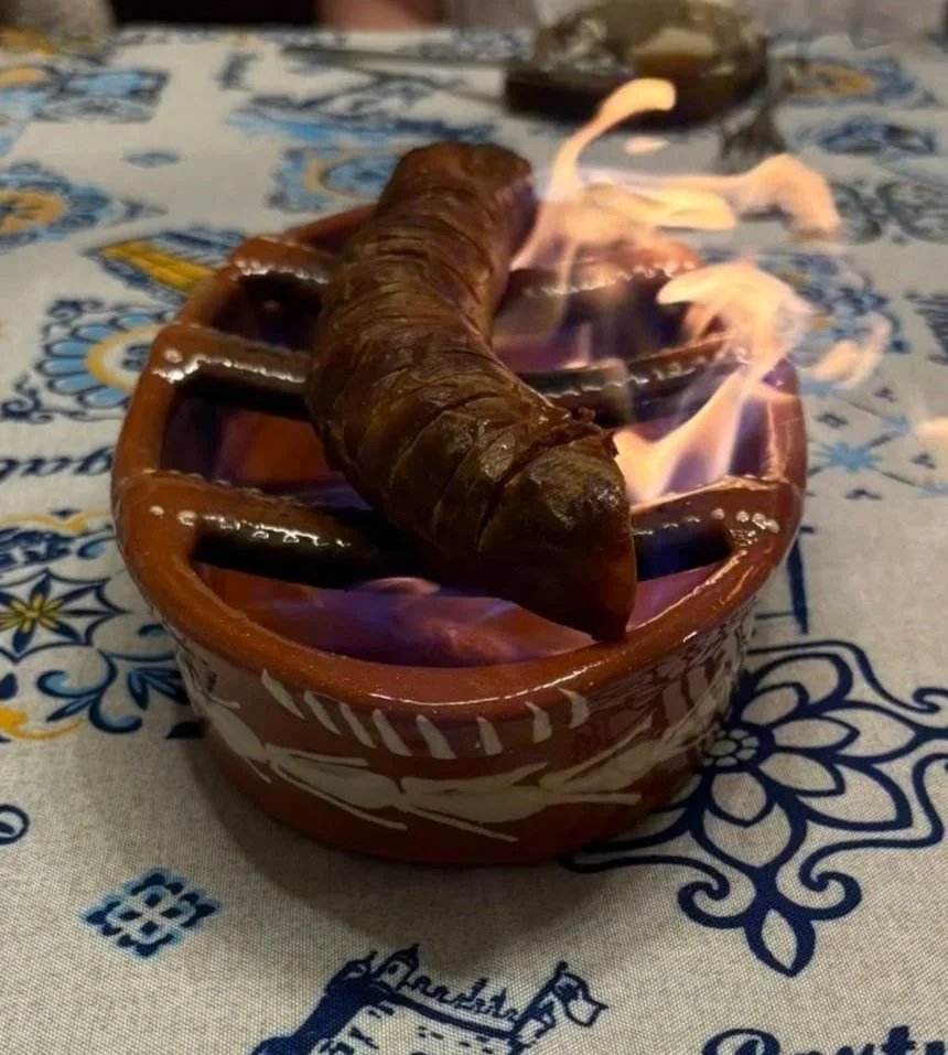 Chouriço assado -- Grilled Portuguese sausage