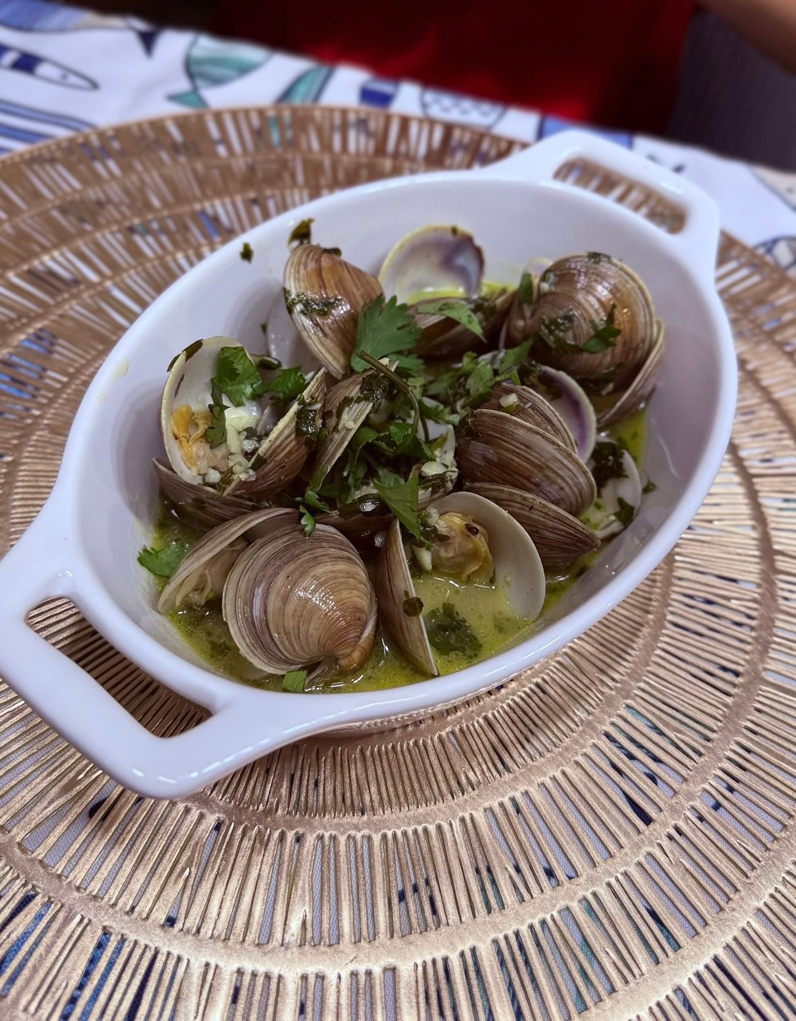 Amêijoas à Bulhão Pato -- Clams in white wine sauce, garlic and cilantro
