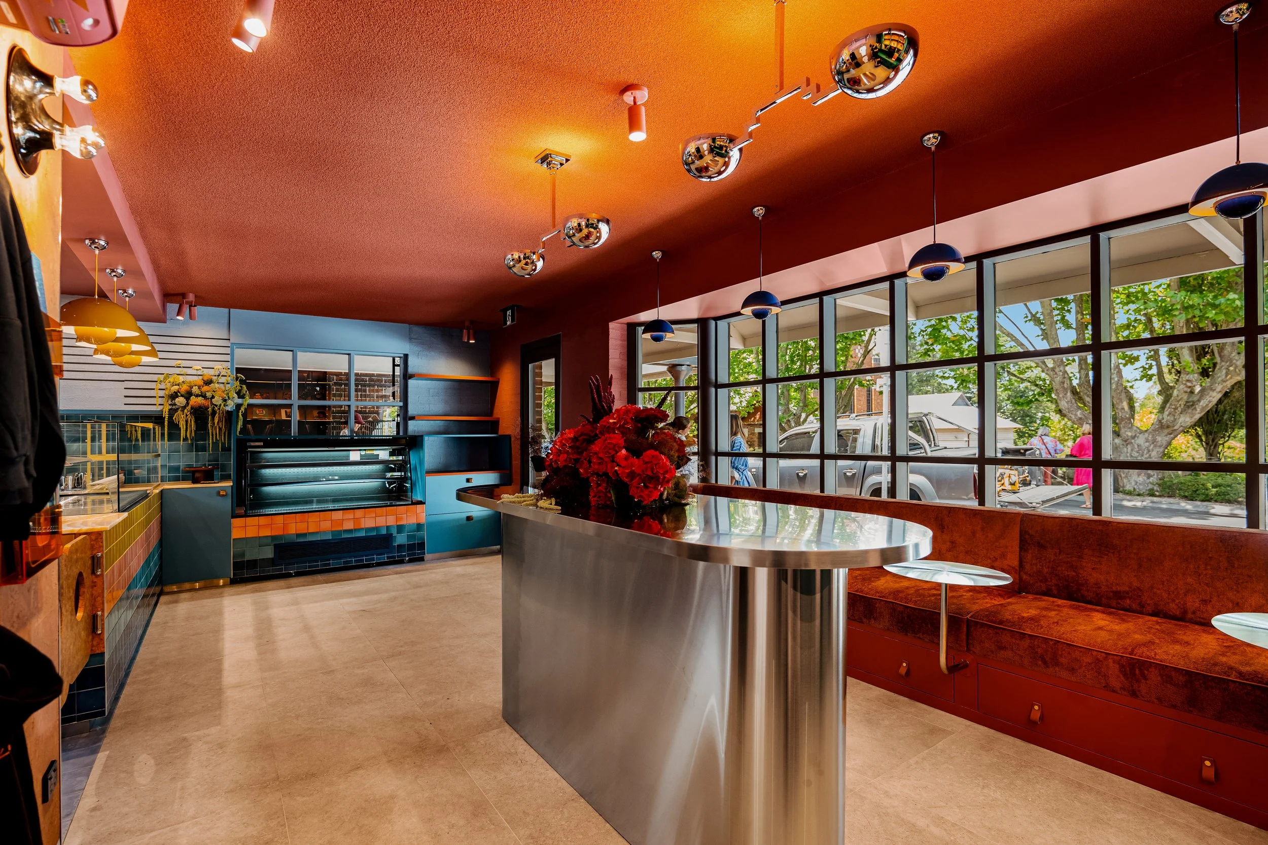 An image of the interior design by La Vaur Studio, Little Sista which is a cafe selling focaccias, coffee, pastries and various snacks.