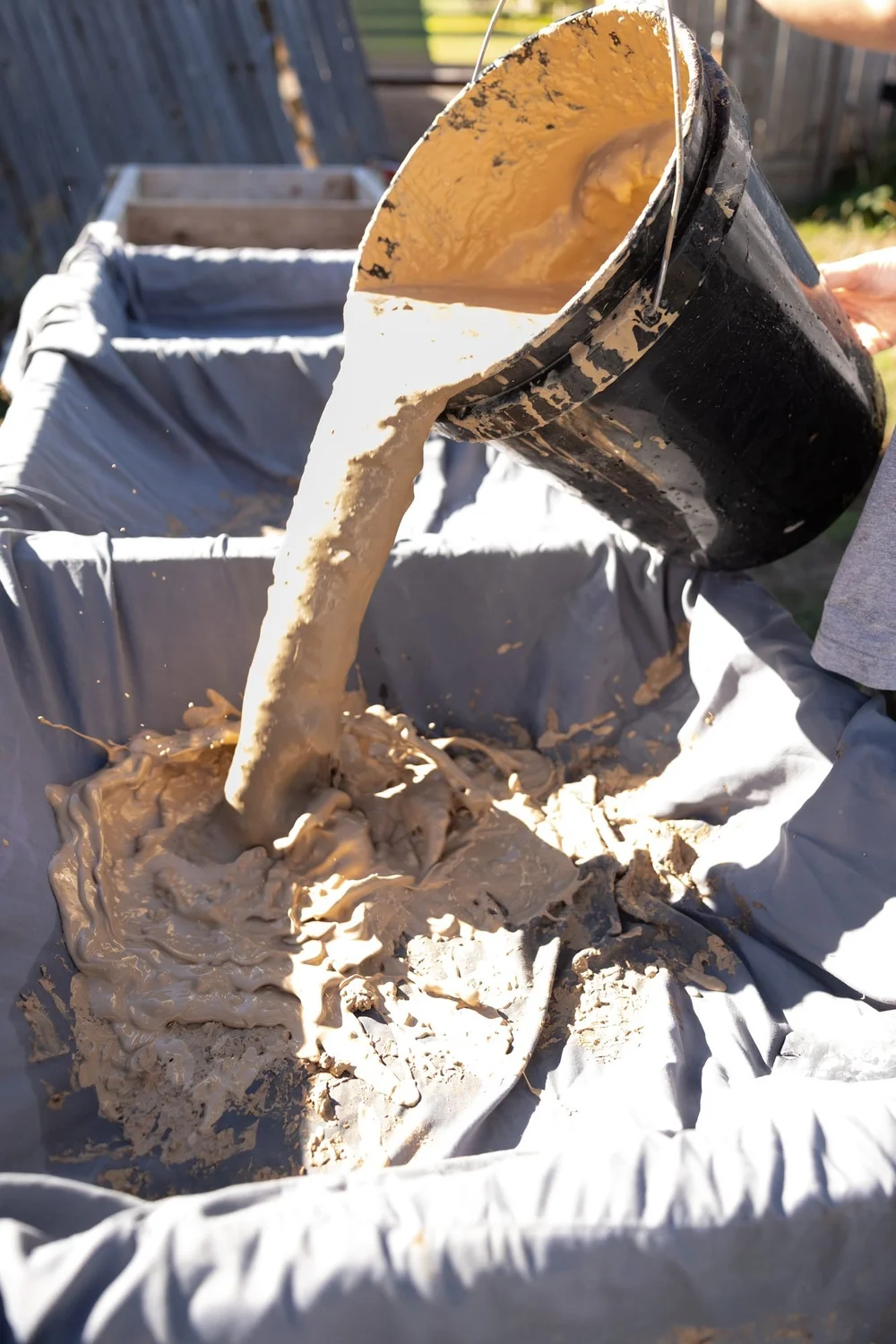 Clay slurry poured into a drying cloth