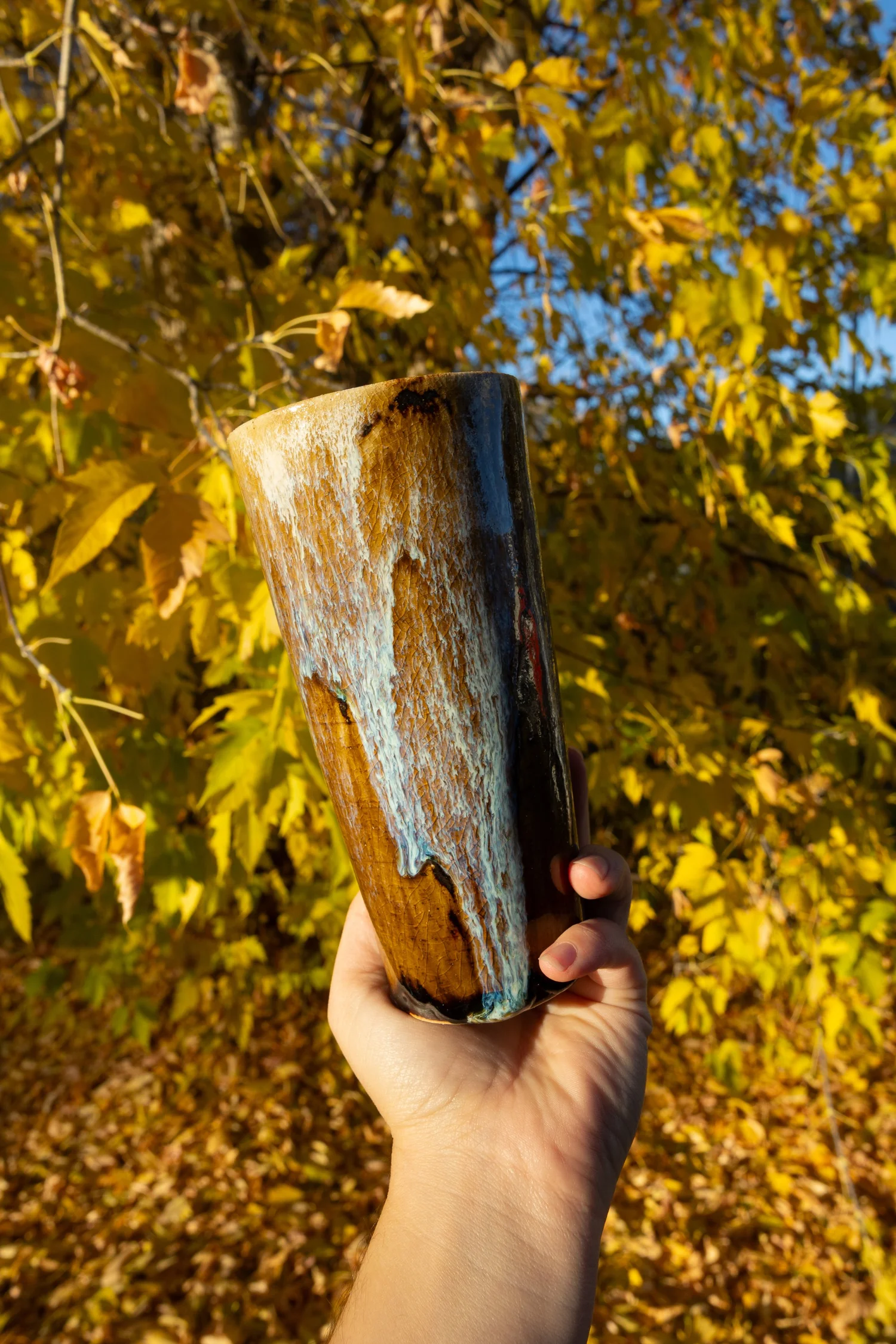Tall stoneware cup