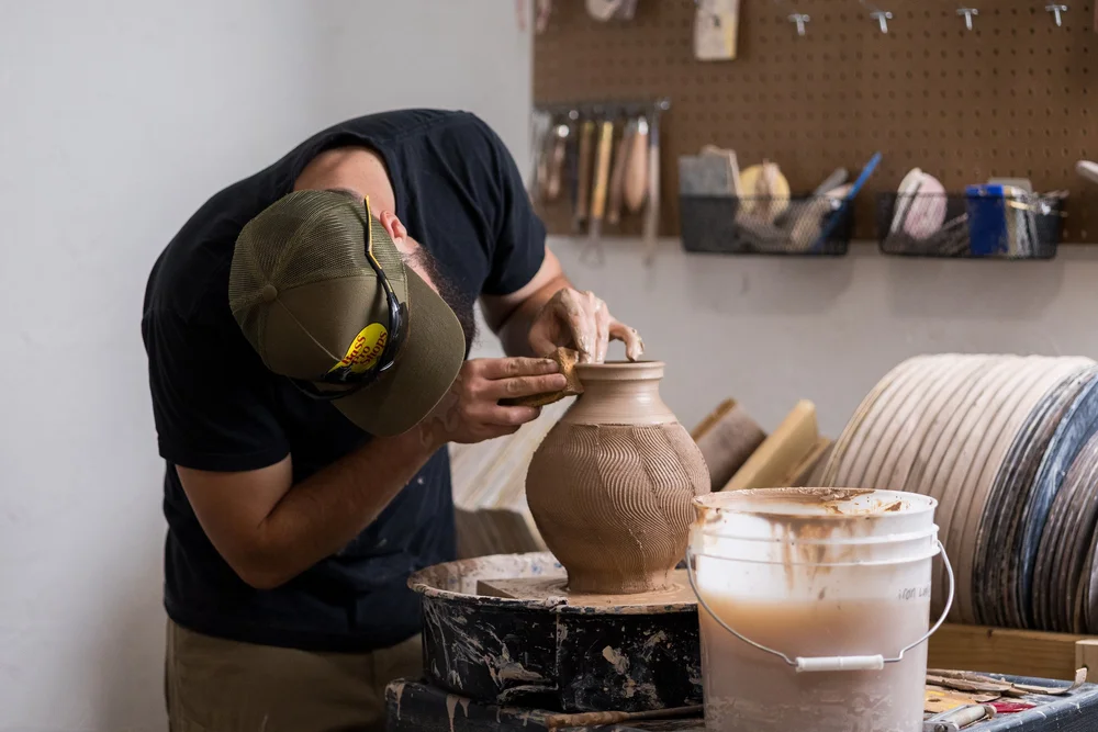 Adam at work in his Logan studio